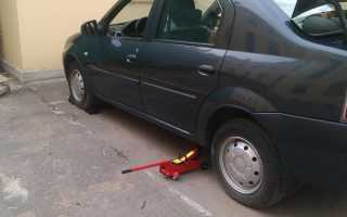 Замена передних тормозных колодок на автомобиле Рено Логан